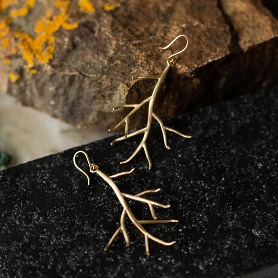 Gold branch earrings by Hannah Blount