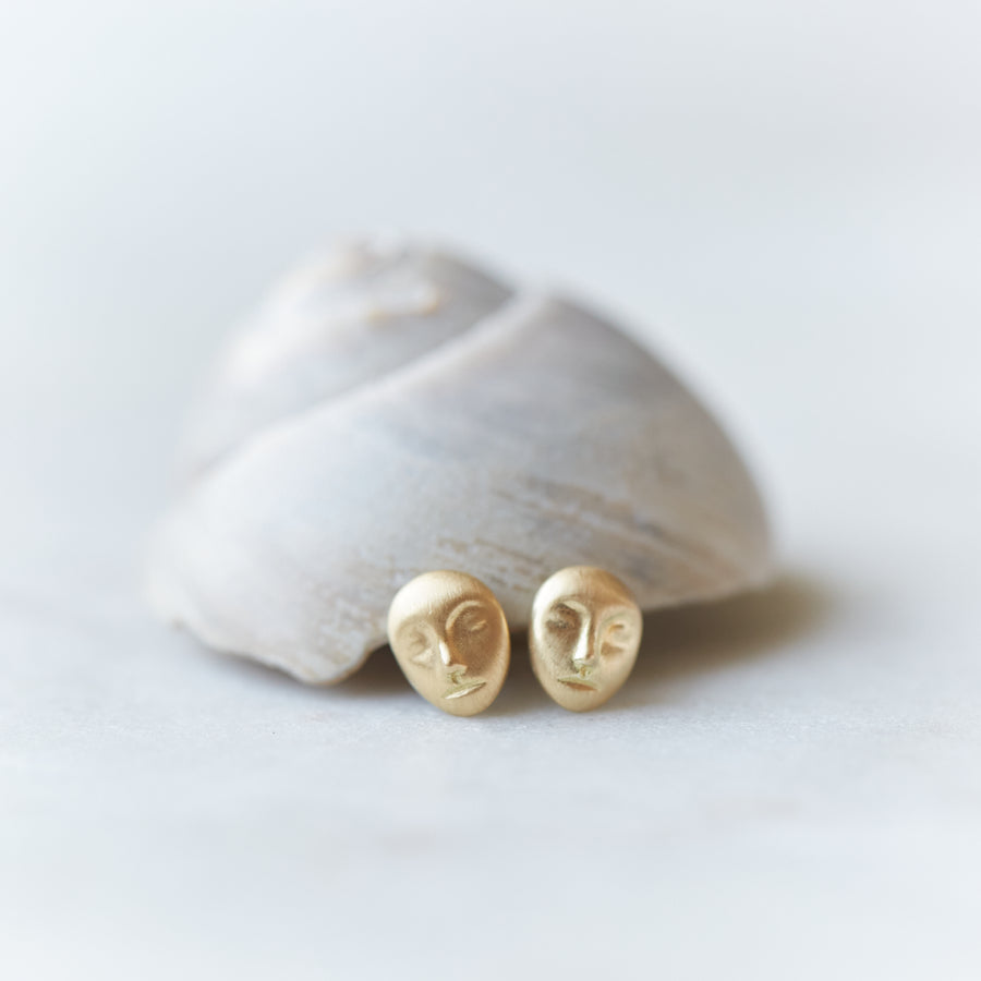Gold cameo studs by Hannah Blount