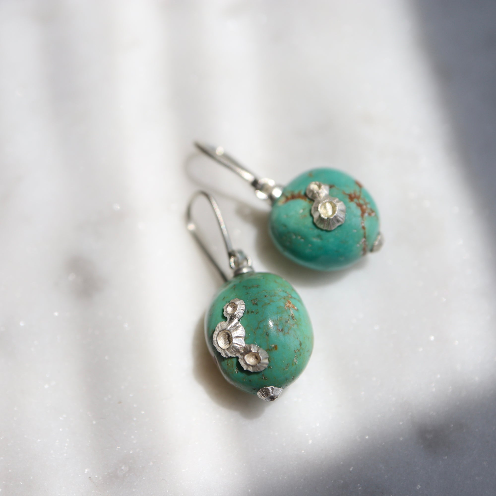 blue green turquoise earrings with silver barnacles