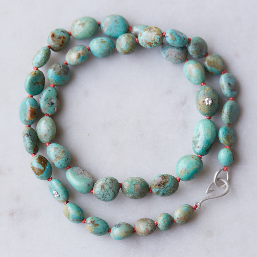 Kingman turquoise necklace with coral-hued silk and silver clasp by Hannah Blount
