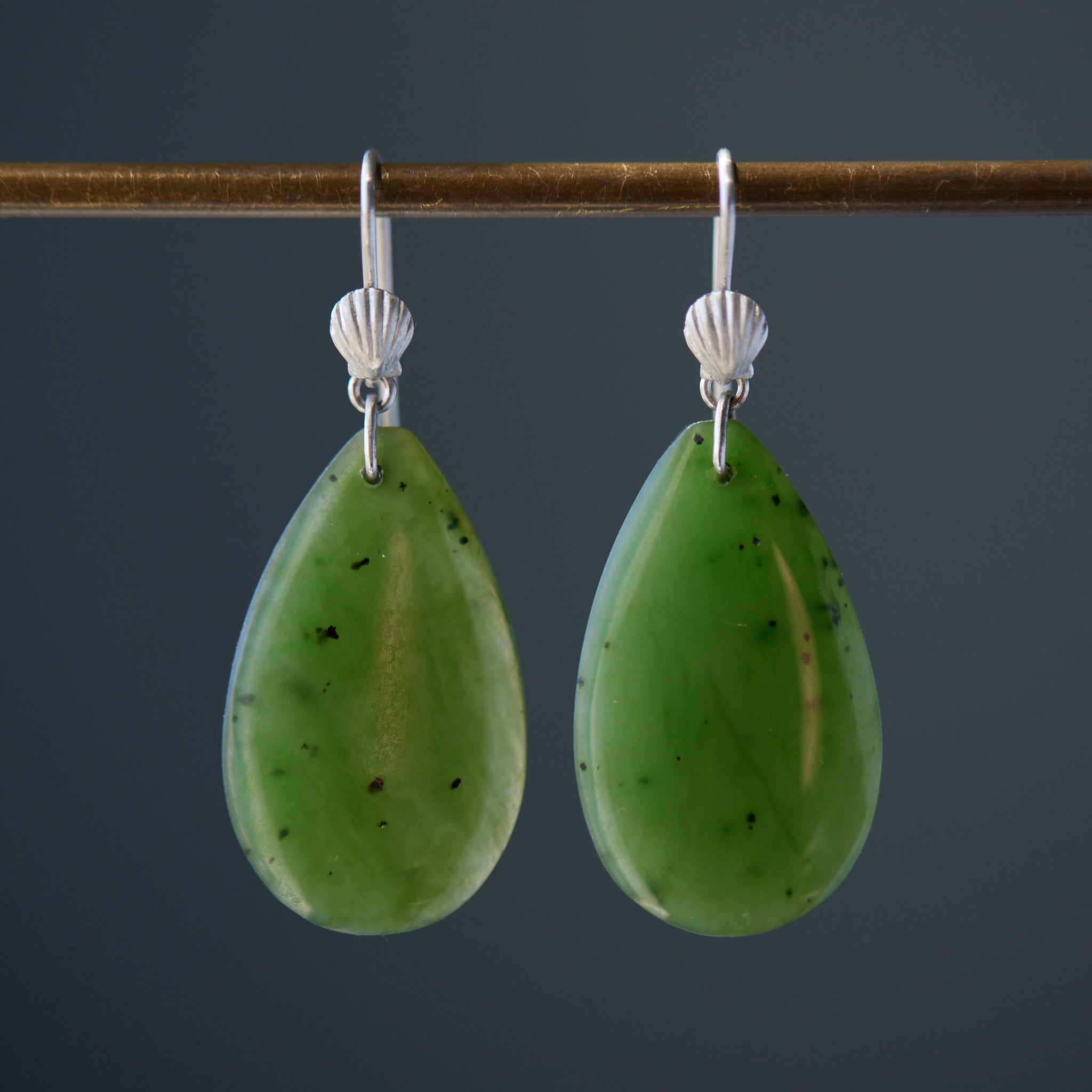 green teardrops under silver scallop ear wires