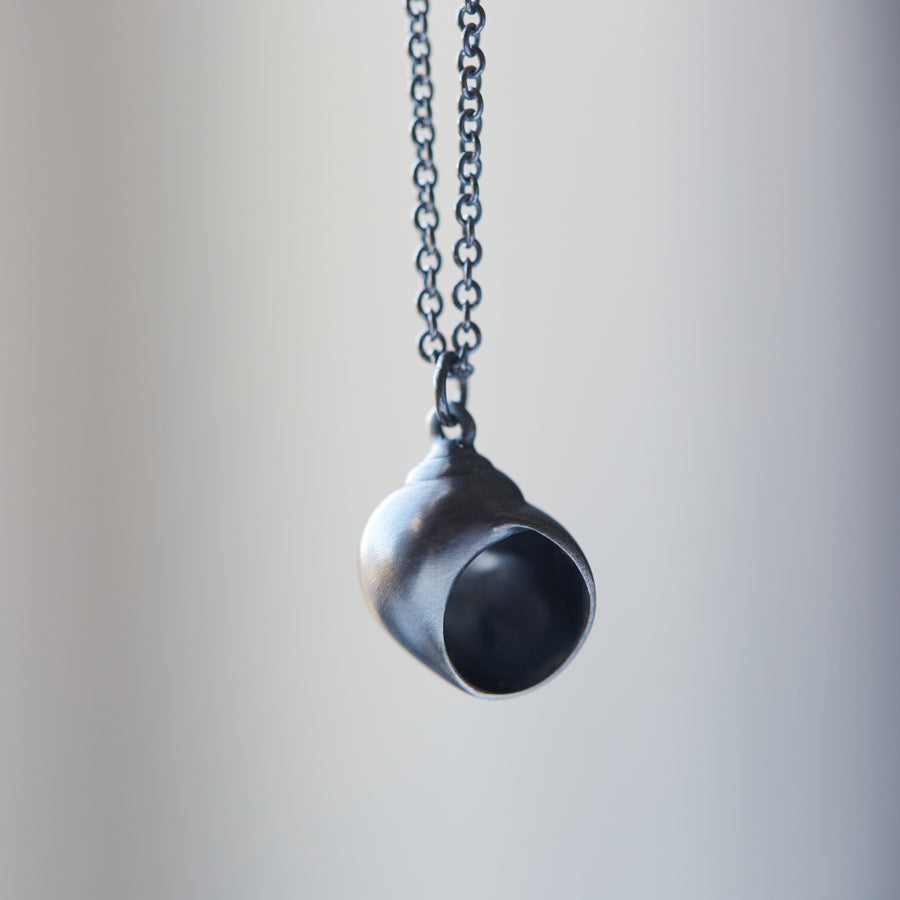 Little moon snail shell oxidized silver necklace by Hannah Blount