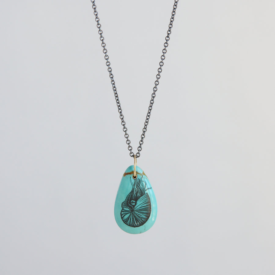 Turquoise teardrop pendant necklace with a nautilus illustration on a light gray background