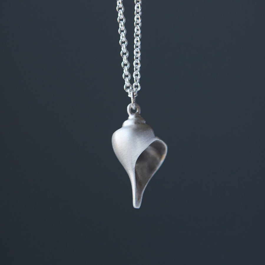 Silver whelk shell necklace by Hannah Blount