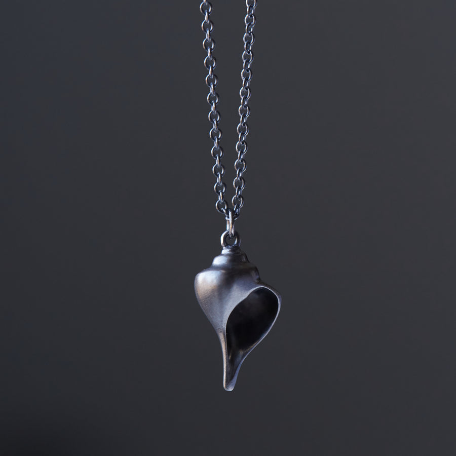 Oxidized silver whelk shell necklace by Hannah Blount
