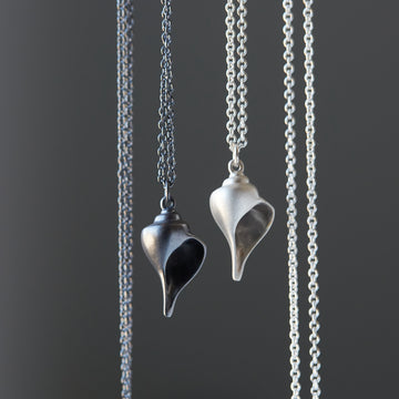 Silver whelk shell necklace by Hannah Blount