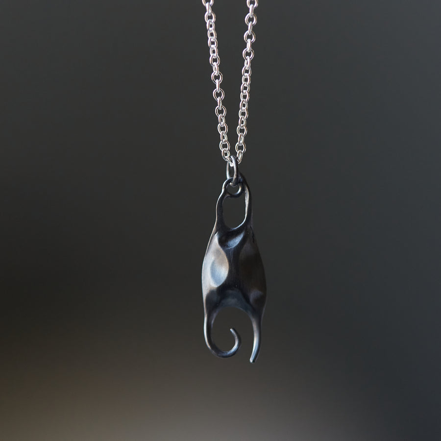 Skate egg necklace with silver chain by Hannah Blount