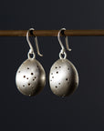 Speckled egg earrings in silver by Hannah Blount
