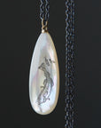 Codfish and school of fish scrimshaw on mother of pearl - necklace