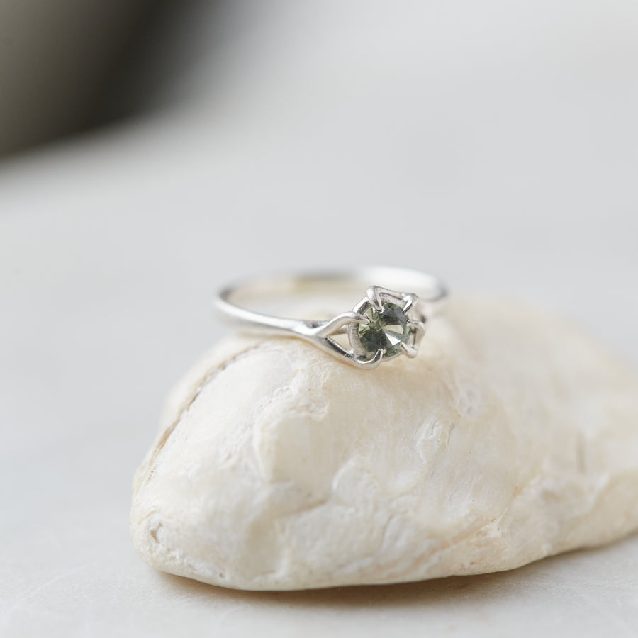 ring of green montana sapphire set in silver branches by hannah blount