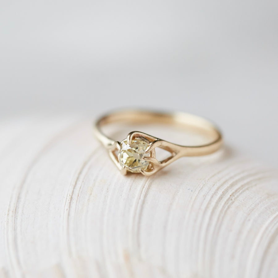 ring of yellow old mine cut diamond set in gold branches by hannah blount