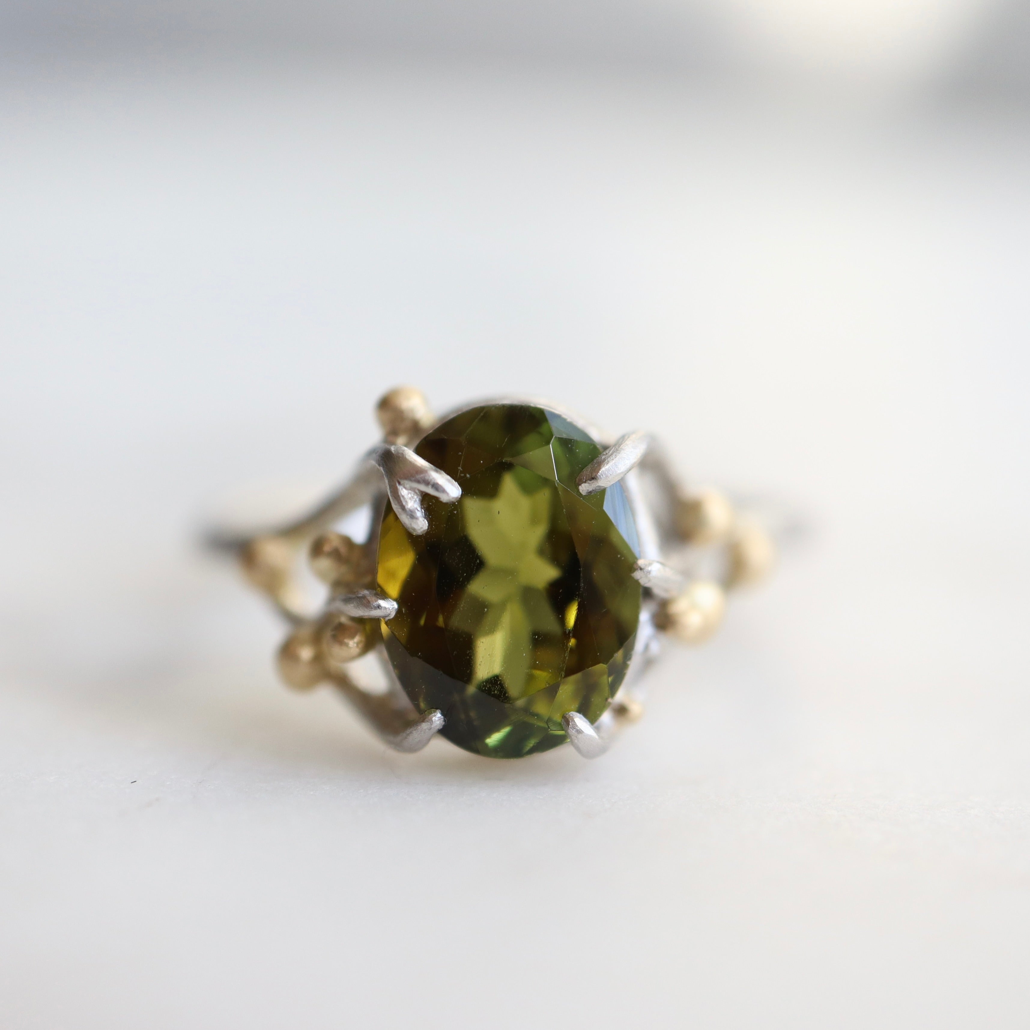2.07ct Tourmaline waiting ring set in platinum with 18k gold berries.