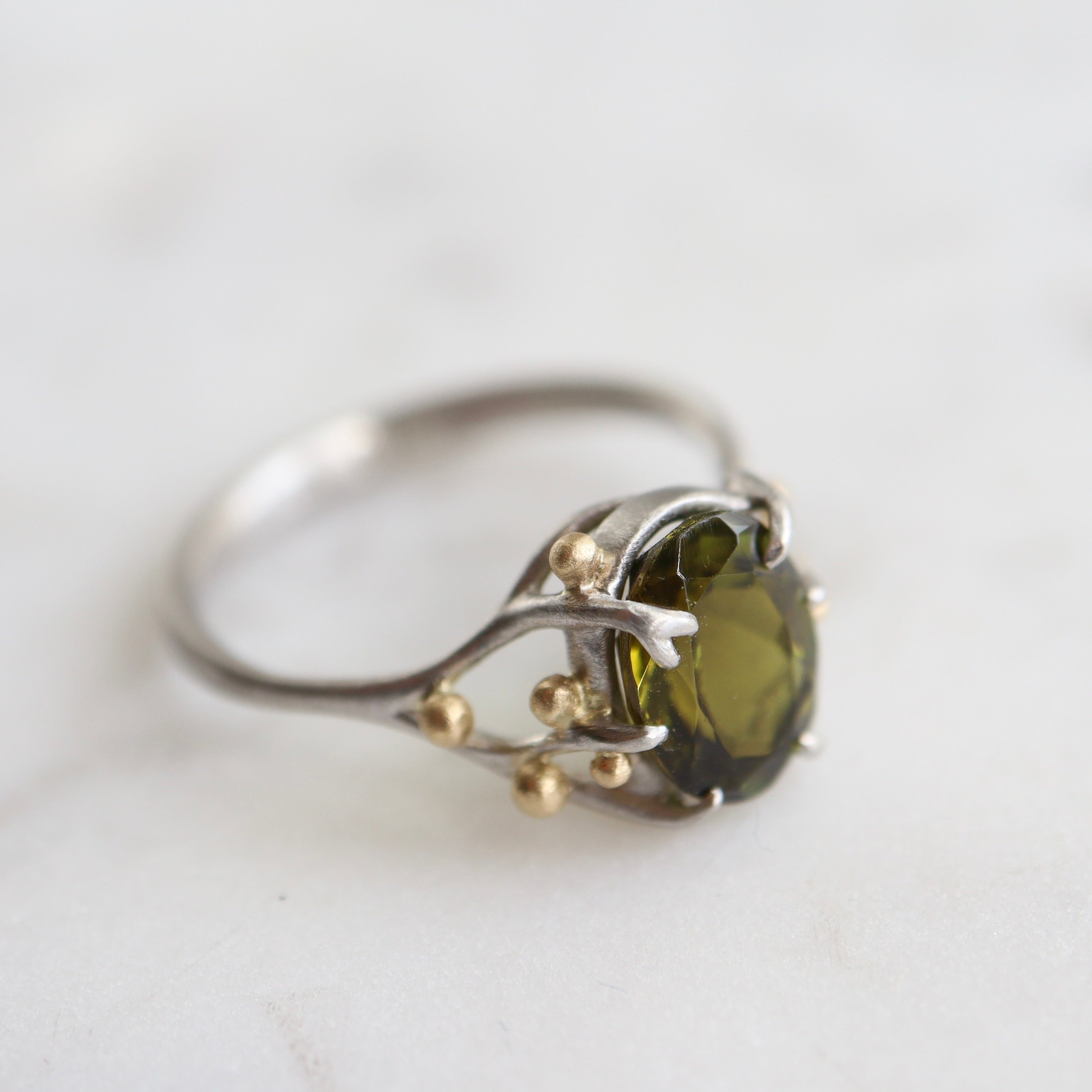 2.07ct Tourmaline waiting ring set in platinum with 18k gold berries.