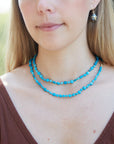 Kingman turquoise double-strand necklace with aloe-hued silk and gold clasp by Hannah Blount
