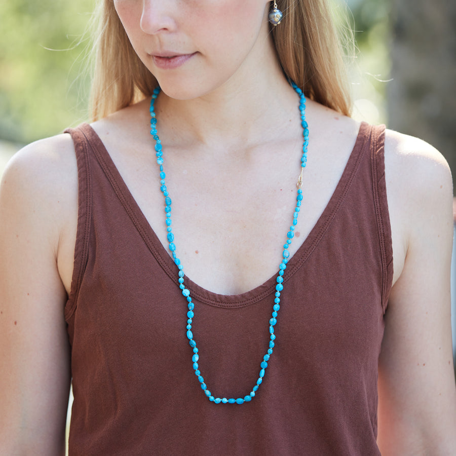 Kingman turquoise double-strand necklace with aloe-hued silk and gold clasp by Hannah Blount