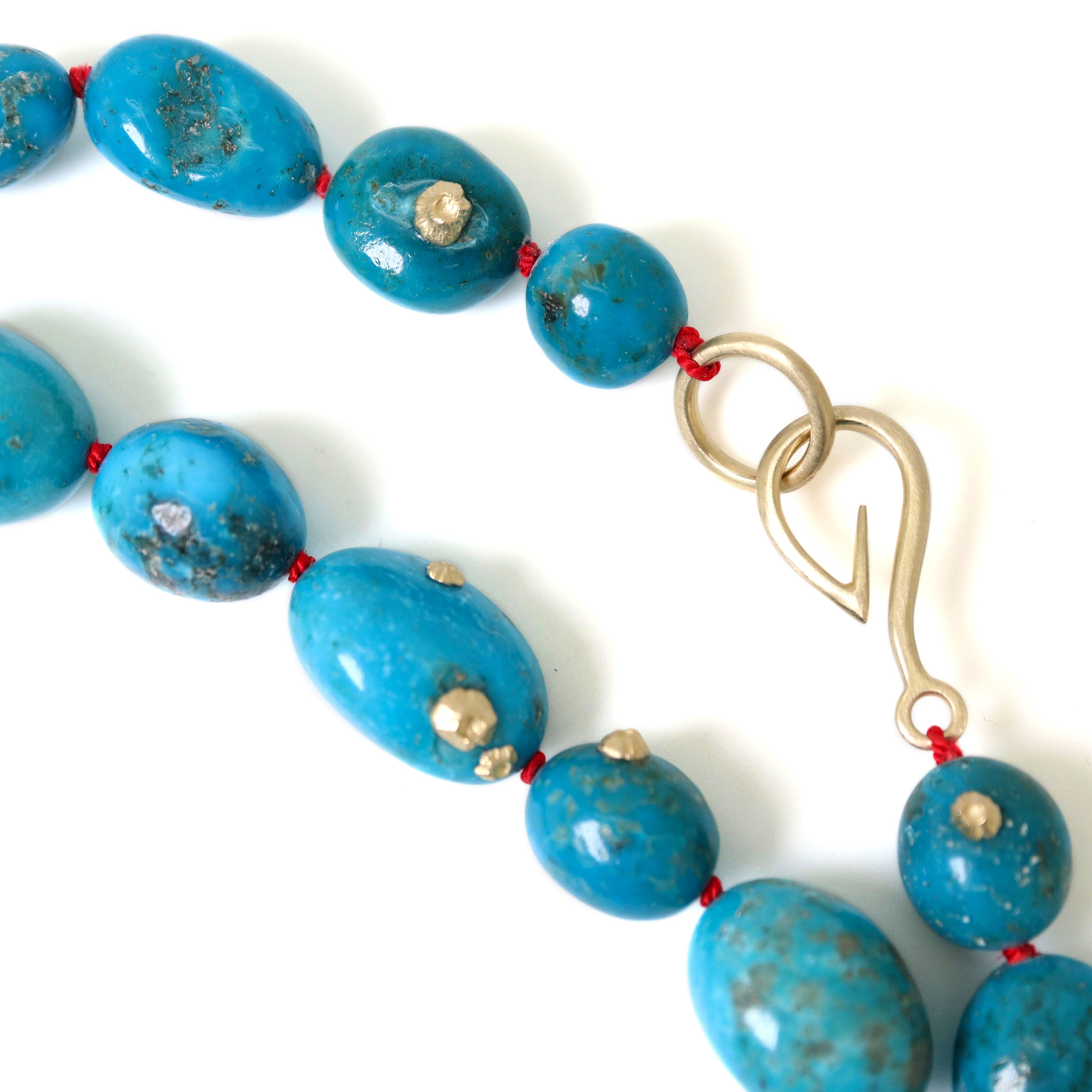 Turquoise beaded necklace with gold barnacles by Hannah Blount