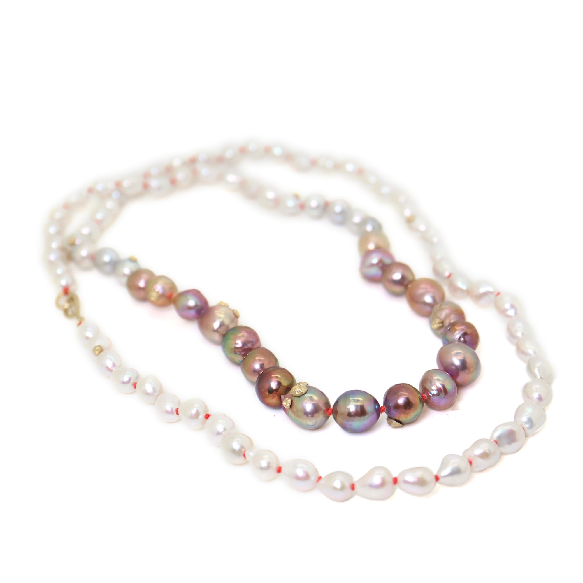 pink and white freshwater baroque pearl necklace in ombre pattern with gold barnacles and fish hook clasp and coral silk by hannah blount jewelry