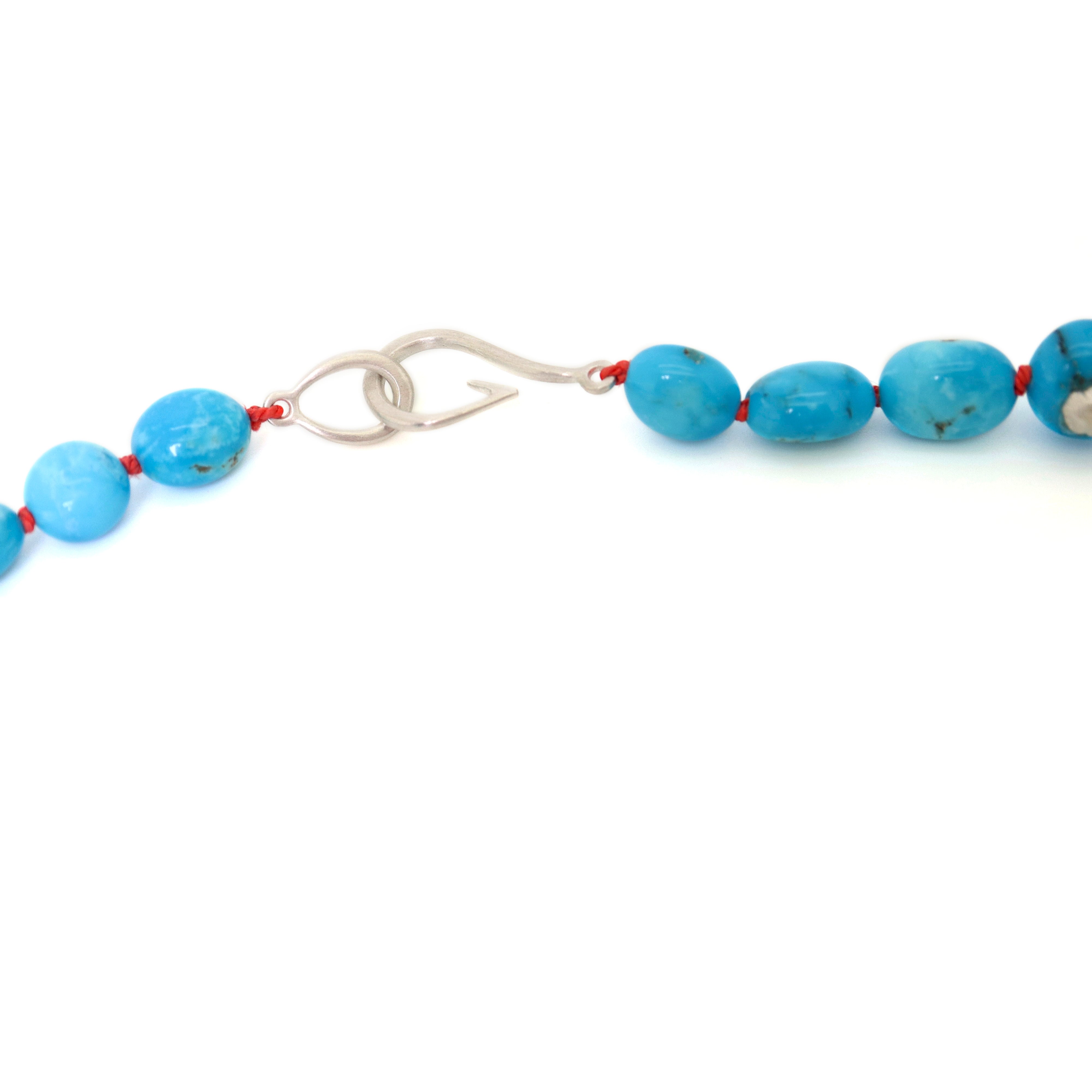 Kingman turquoise necklace with coral-hued silk and silver clasp by Hannah Blount