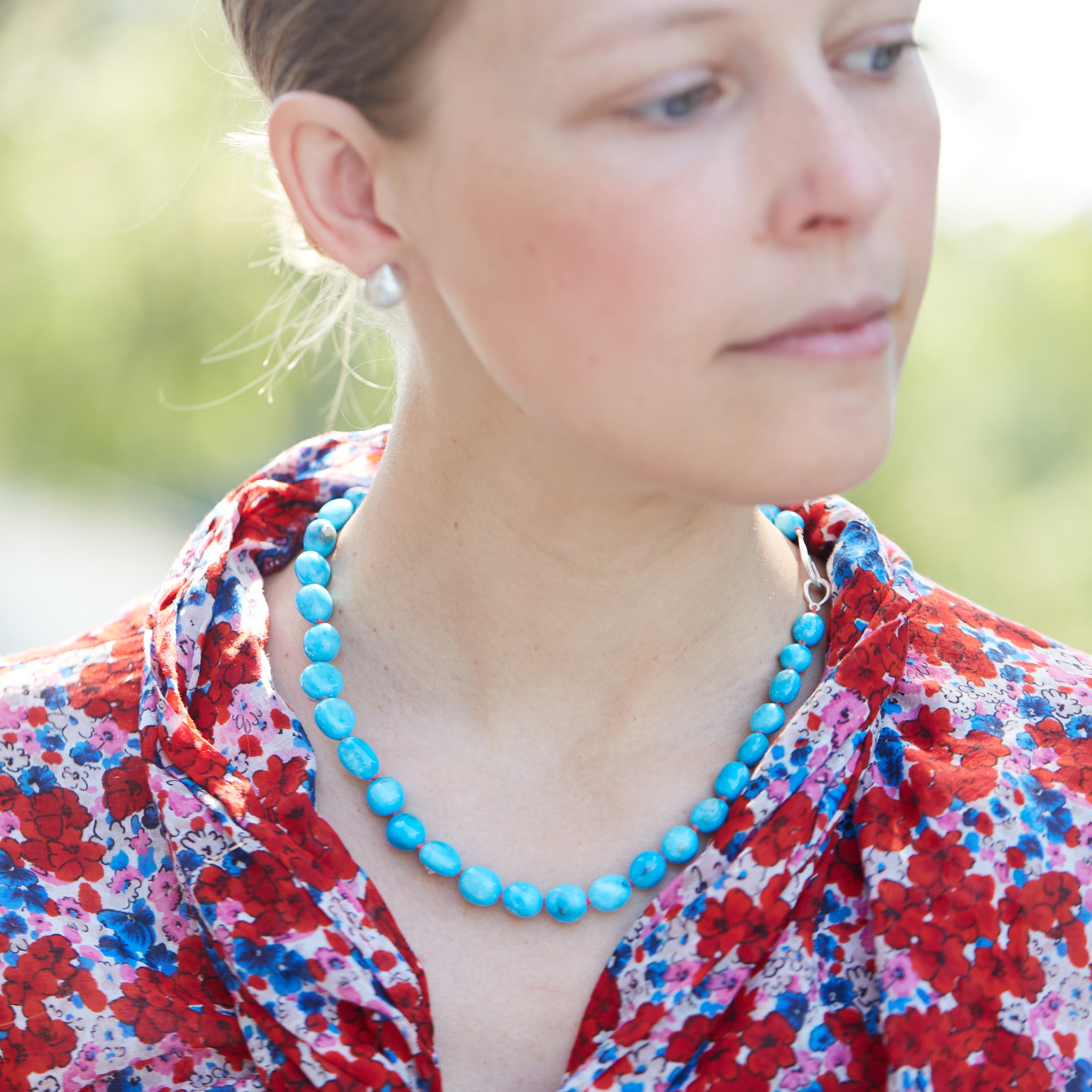 Kingman turquoise necklace with coral-hued silk and silver clasp by Hannah Blount