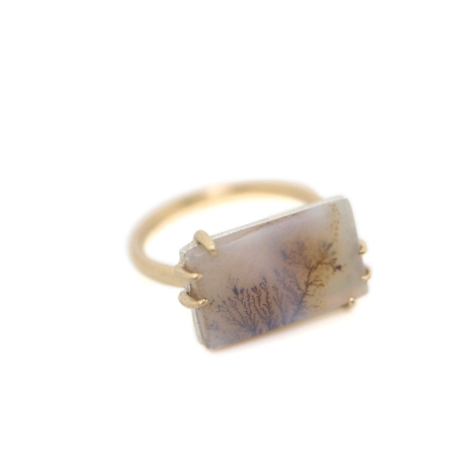 side view of rectangular dendritic agate ring set with gold prongs by hannah blount