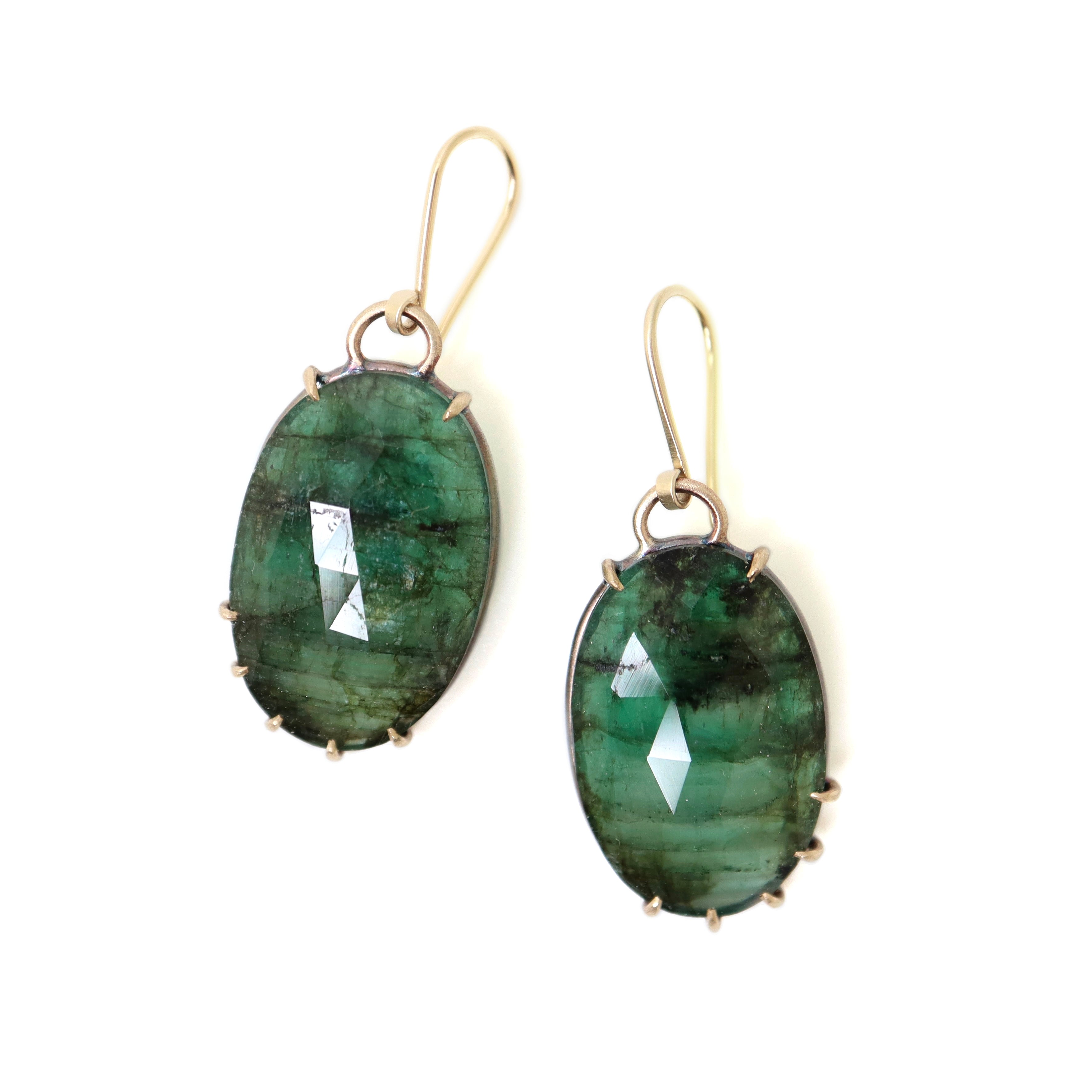 green emerald earrings with gold prongs by hannah blount