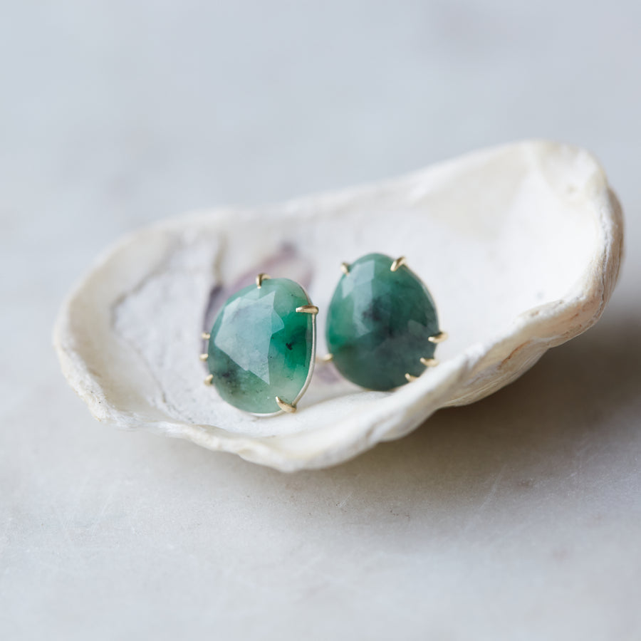 earring studs with emerald gemstones set in 14k gold