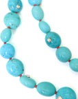Kingman turquoise double-strand necklace with coral-hued silk and silver clasp by Hannah Blount