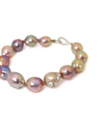 Pink freshwater pearl bracelet with silver barnacles and fish hook clasp by Hannah Blount