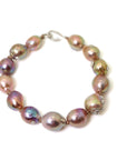 Pink freshwater pearl bracelet with silver barnacles and fish hook clasp by Hannah Blount