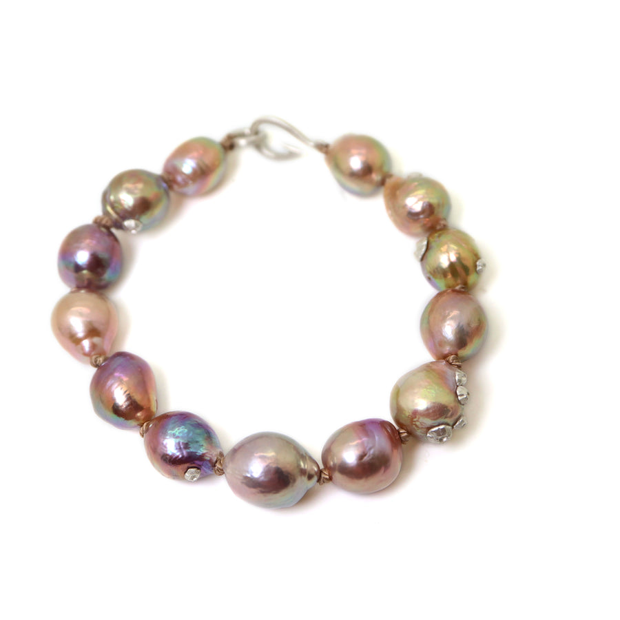 Pink freshwater pearl bracelet with silver barnacles and fish hook clasp by Hannah Blount