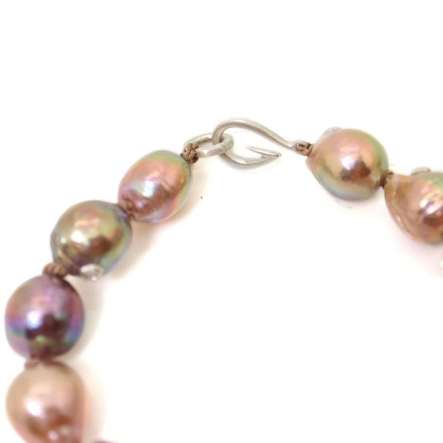 Pink freshwater pearl bracelet with silver barnacles and fish hook clasp by Hannah Blount