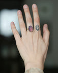 big pink ring on hand