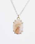 Dendritic agate necklace with gold prongs 
