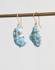 Blue turquoise earrings with gold prongs