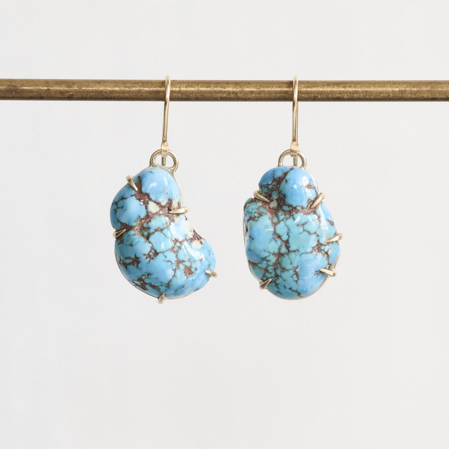 Marbled turquoise earrings in gold prongs