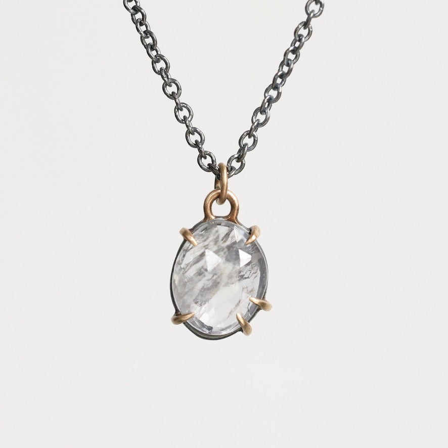 Purple spinel necklace in gold prongs