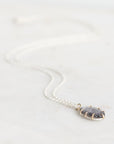Necklace with a pendant on a white background