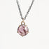 Purple spinel necklace held in gold prongs
