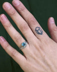 curved band with sapphire ring 