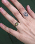 gold ring stacked with gemstone 