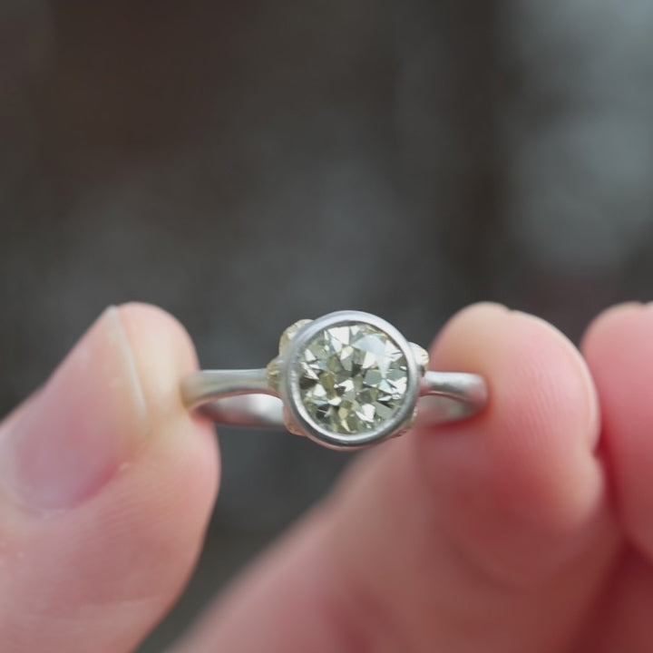 video of silver diamond ring being showed off
