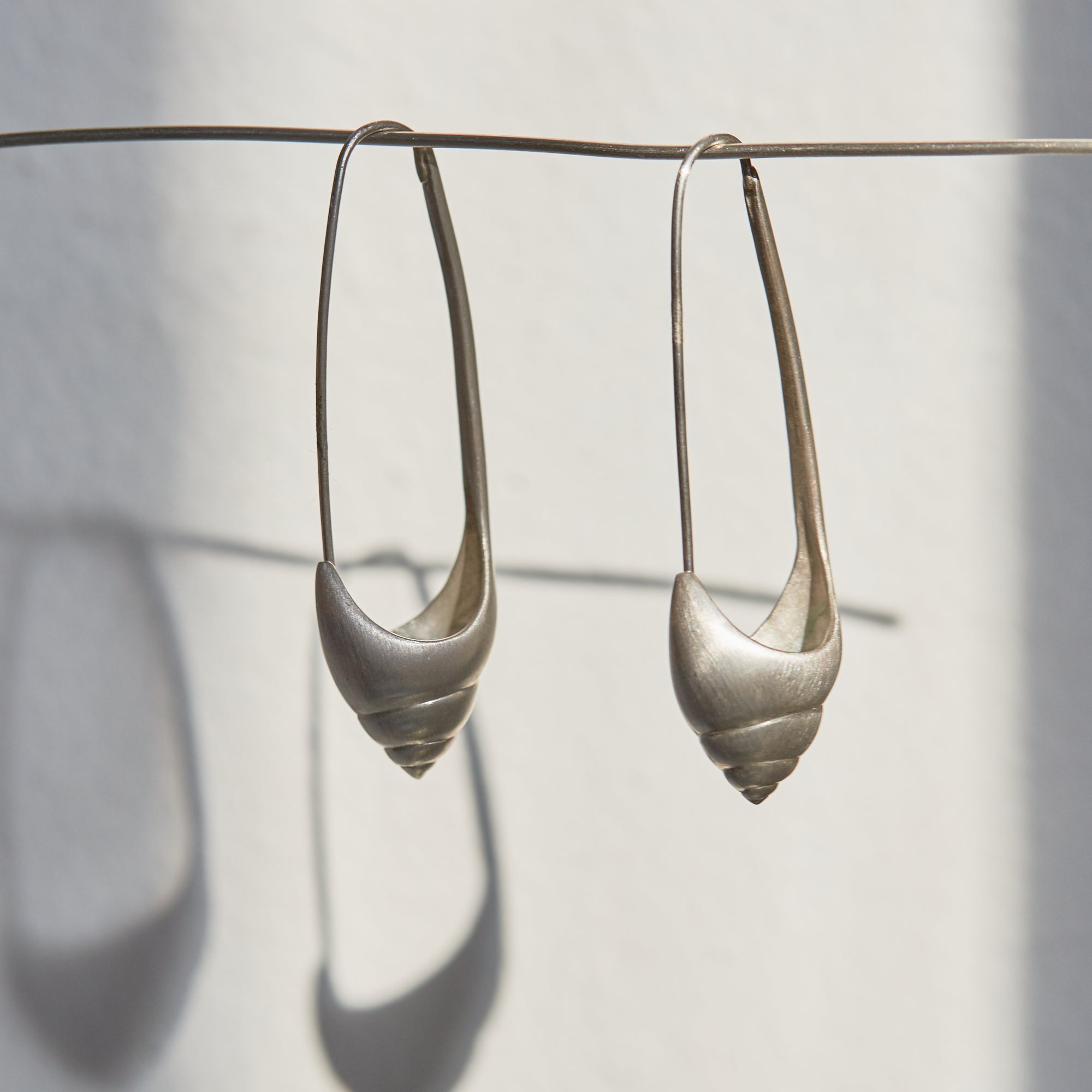 Sea snail hoops - bright silver - Hannah Blount