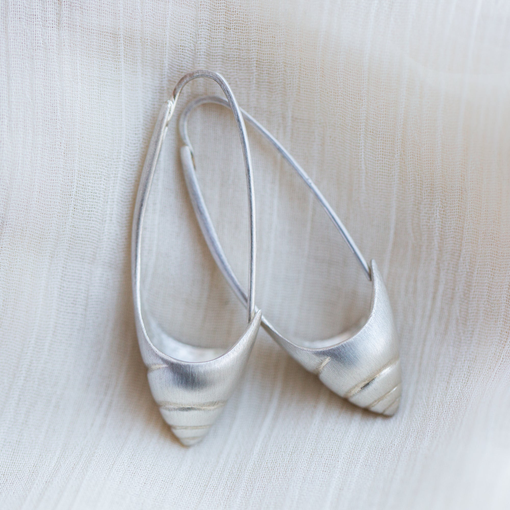 Sea snail hoops - bright silver - Hannah Blount